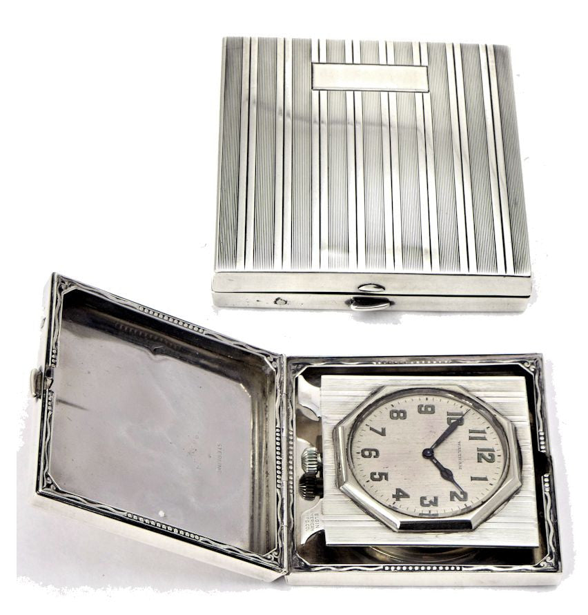 Silver travel clock