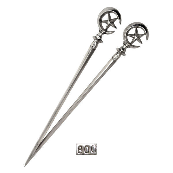 A pair of silver skewers