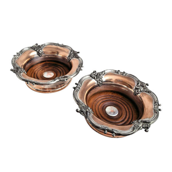 A pair of Sheffield wine coasters