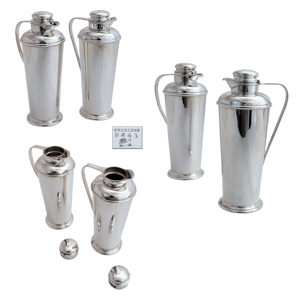 A pair of silver cocktail shakers