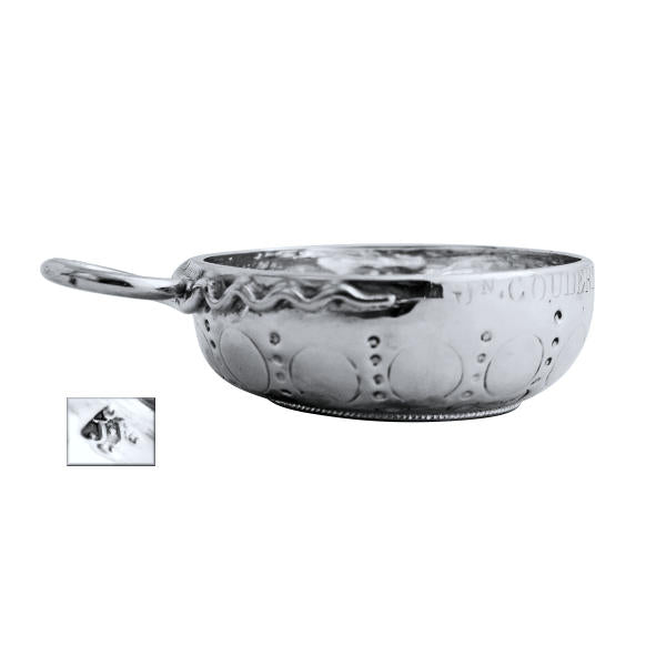 A French silver tastevin