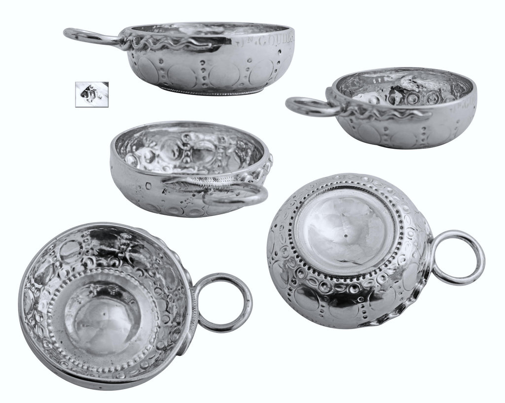 A French silver tastevin